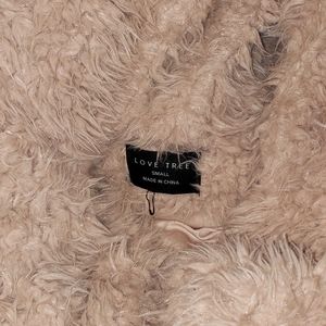 This is a small fur coat.